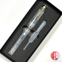 Load image into Gallery viewer, Fine Writing International Fenestro Demonstrator Fountain Pen - Gold